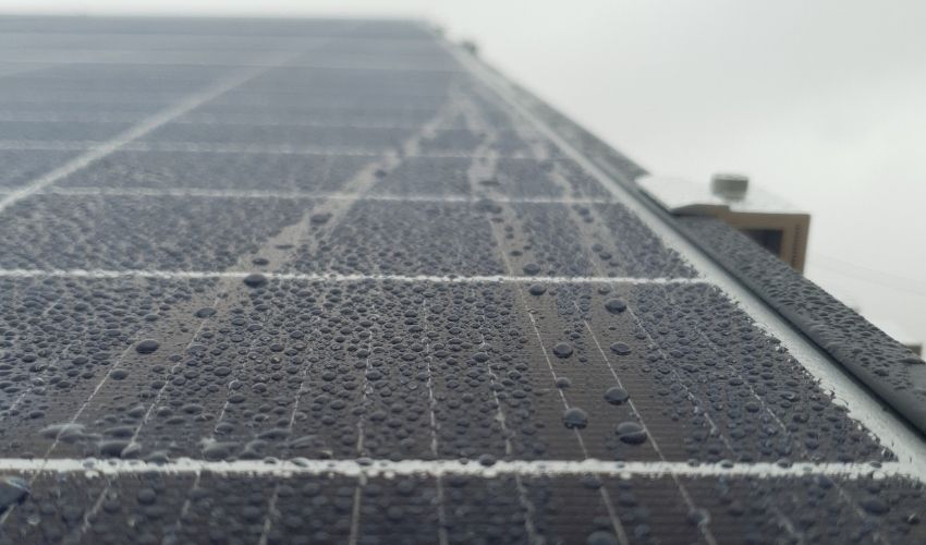 Rain drops on a solar panel facing up