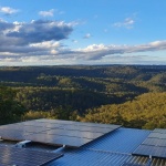 Solar panels on roof overlooking Toowoomba range
